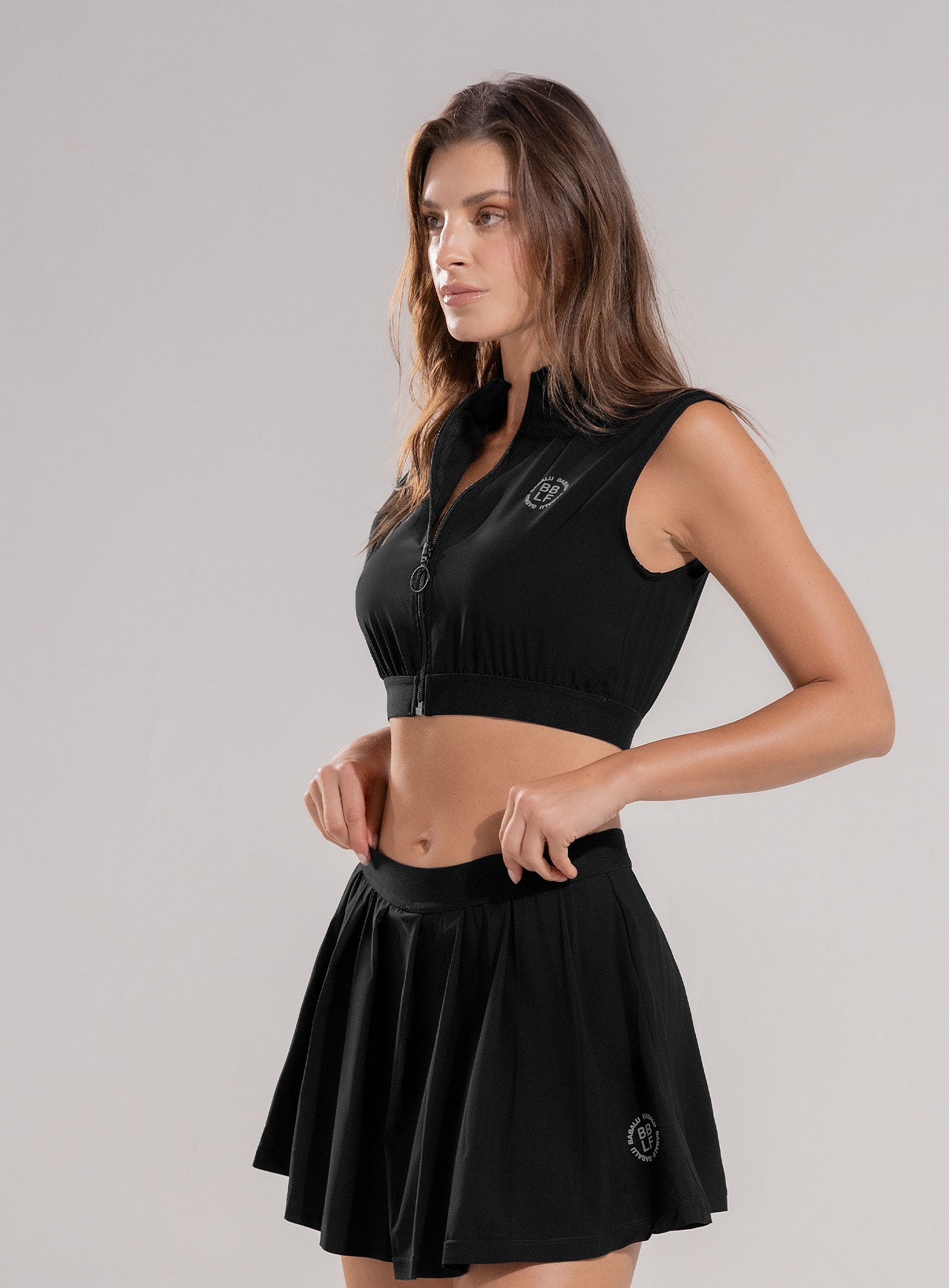 TOP DEPORTIVO SEMI IMPERMEABLE CON CIERRE