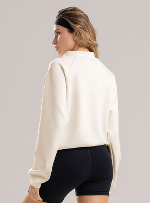 Buzo deportivo Canguro oversize color marfil para mujer, marca BABALÚ, referencia 113943, vista trasera. Compra al por mayor en babalu.com.co en COP.