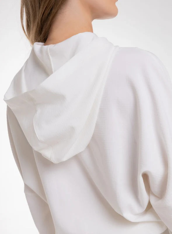 Chaqueta deportiva con cordón graduable tela semi impermeable