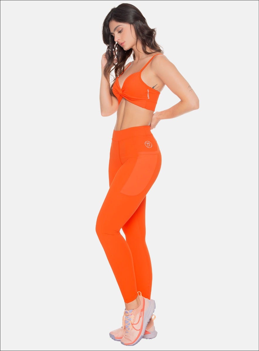 LEGGINS DEPORTITO CON BOLSILLOS  EN MALLA EN POSTERIOR Y COSTADOS