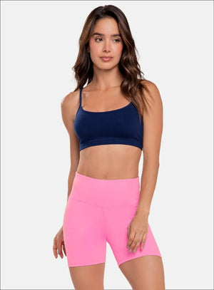 Top deportivo color amarillo neon para mujer, marca BABALÚ, referencia 15943, vista frontal. Compra al por mayor en babalu.com.co en COP.