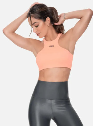 Top deportivo color mandarina para mujer, marca BABALÚ, referencia 95763, vista frontal. Compra al por mayor en babalu.com.co en COP.