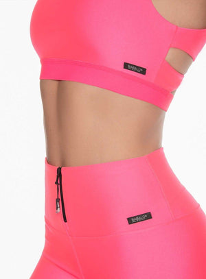 Top deportivo color rosado neon para mujer, marca BABALÚ, referencia 109223, vista lateral. Compra al por mayor en babalu.com.co en COP.