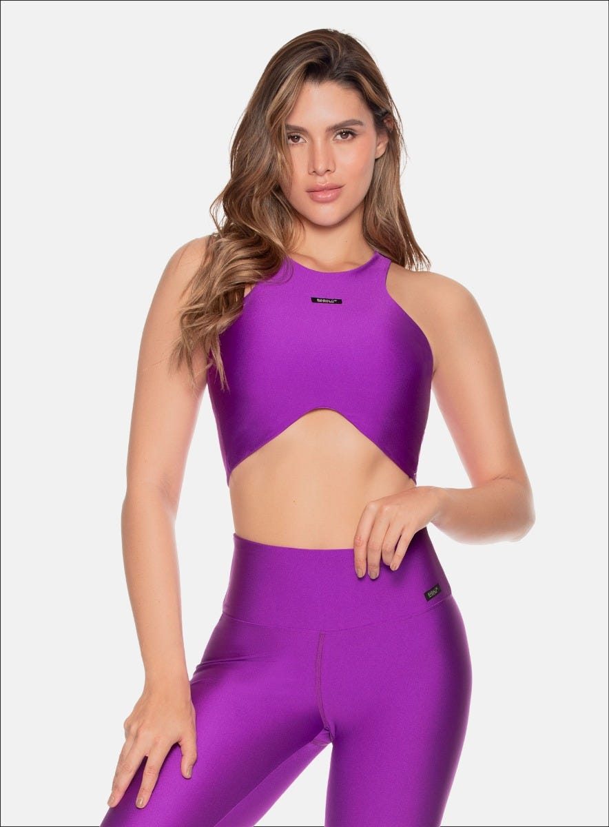 TOP CON ELASTICO ENCARTERADOS DISEÑO EN FRENTE CON CURVA EN CINTURA TELA EFECTO BRILLANTE TACTO SUAVE