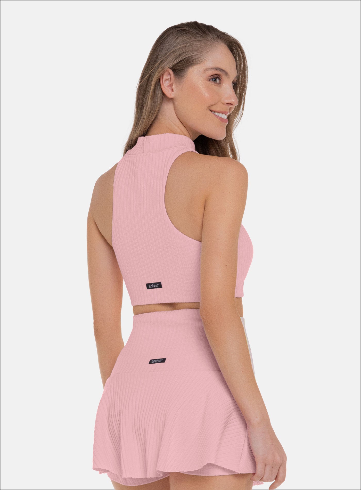 TOP DEPORTIVO CUELLO ALTO TELA RIB