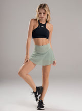 FALDA DEPORTIVA EN TELA SEMI TRANSPARENTE INCLUYE SHORT INTERNO