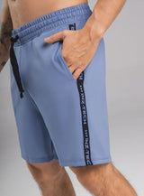 PANTALONETA DEPORTIVA EN TELA BURDA CON CIERRE TERMO SELLADO