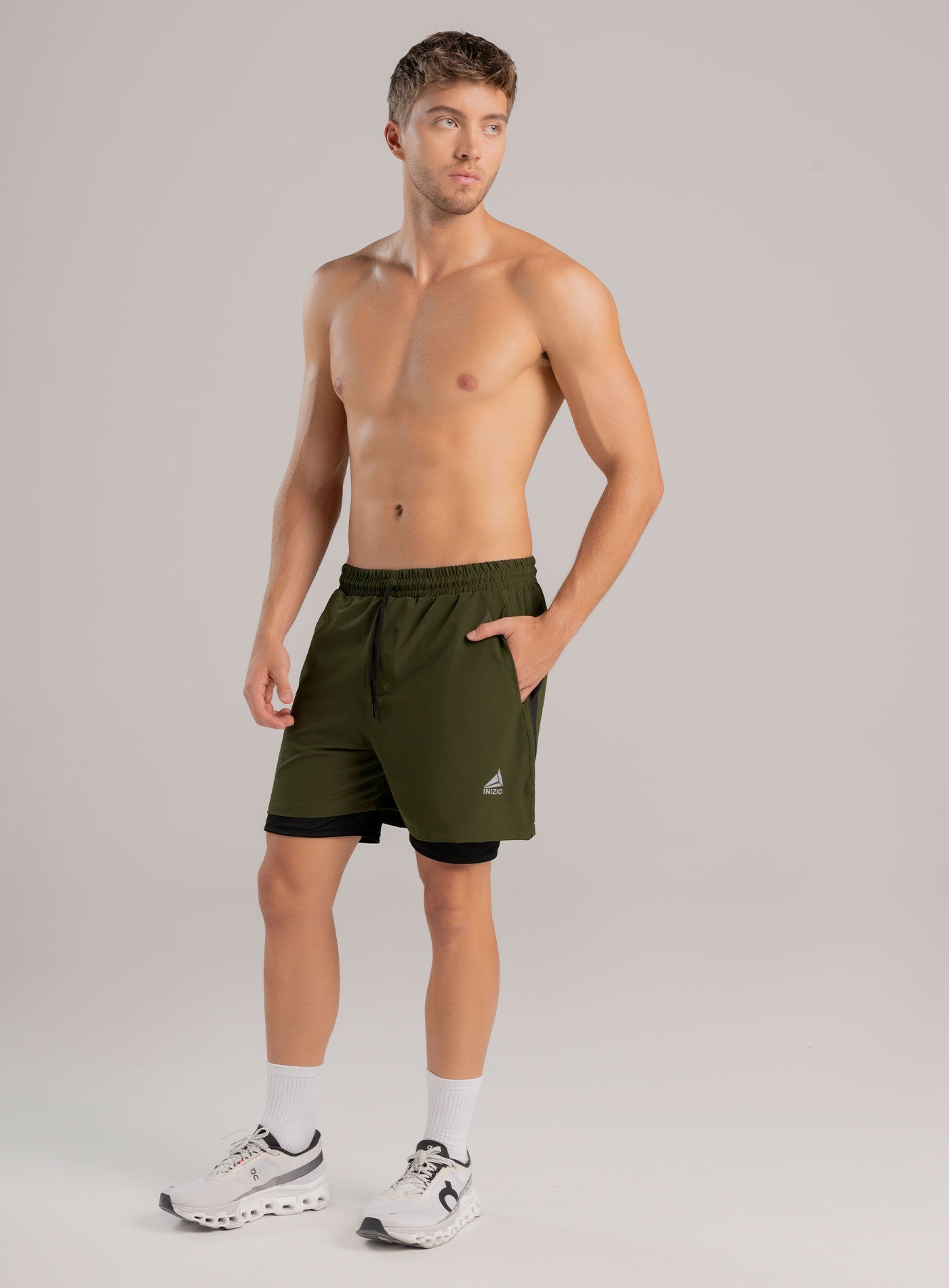 PANTALONETA DEPORTIVA SEMI IMPERMEABLE CON MALLA EN COSTADO INCLUYE SHORT INTERNO