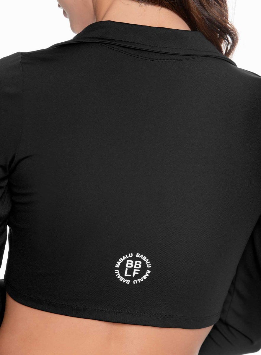 Buzo deportivo color negro para mujer, marca BABALÚ, referencia 109263, vista trasera. Compra al por mayor en babalu.com.co en COP.