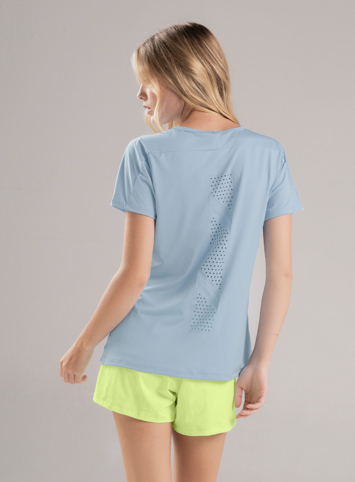 Camiseta deportiva color azul para mujer, marca BABALÚ, referencia 113133, vista trasera. Compra al por mayor en babalu.com.co en COP.