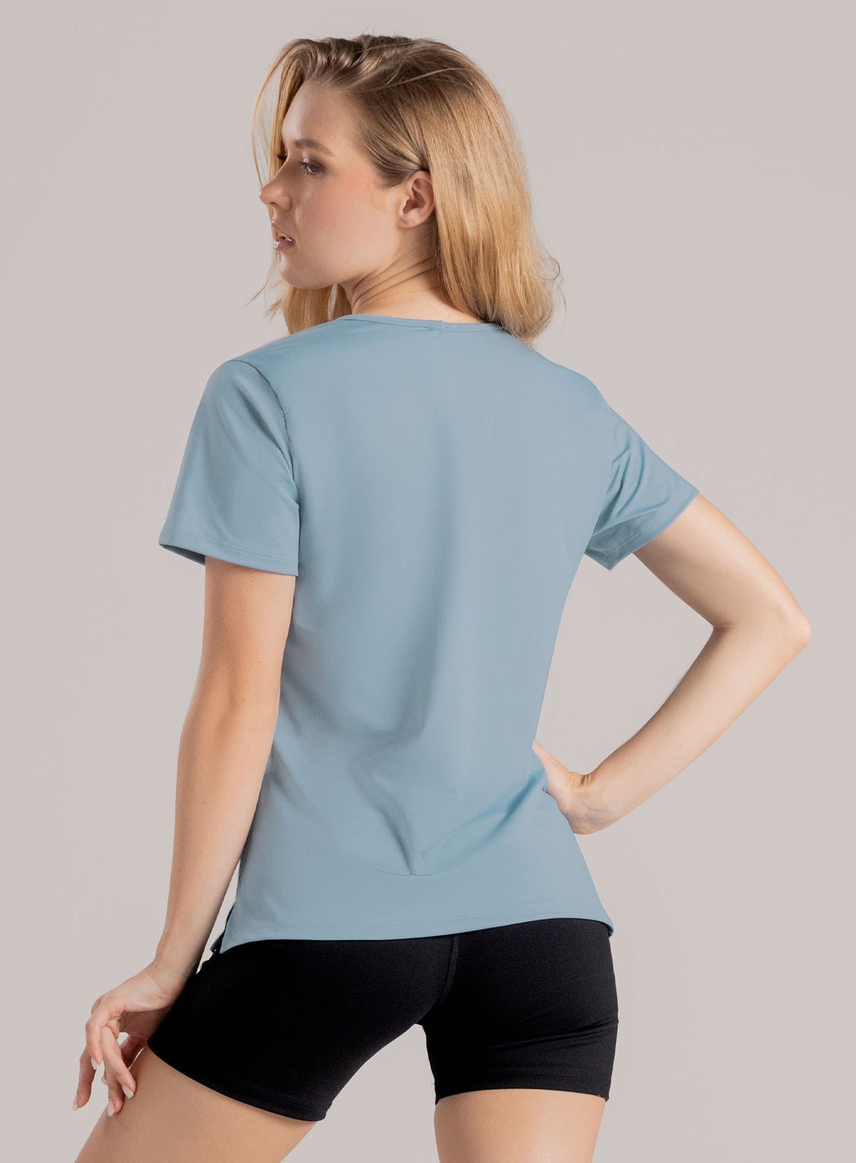 Camiseta deportiva color azul para mujer, marca BABALÚ, referencia 114753, vista trasera. Compra al por mayor en babalu.com.co en COP.