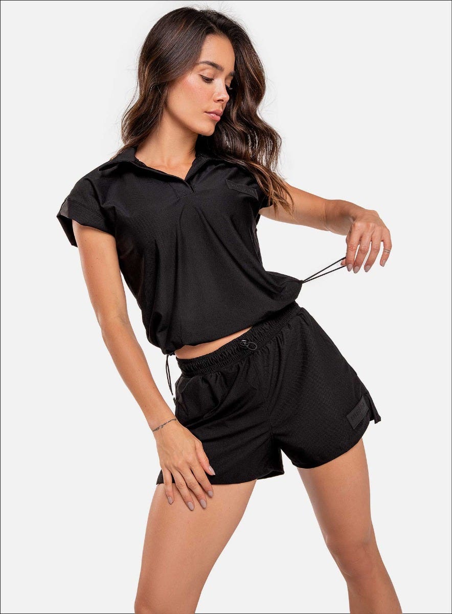 Camiseta deportiva color negro para mujer, marca BABALÚ, referencia 111113, vista frontal. Compra al por mayor en babalu.com.co en COP.