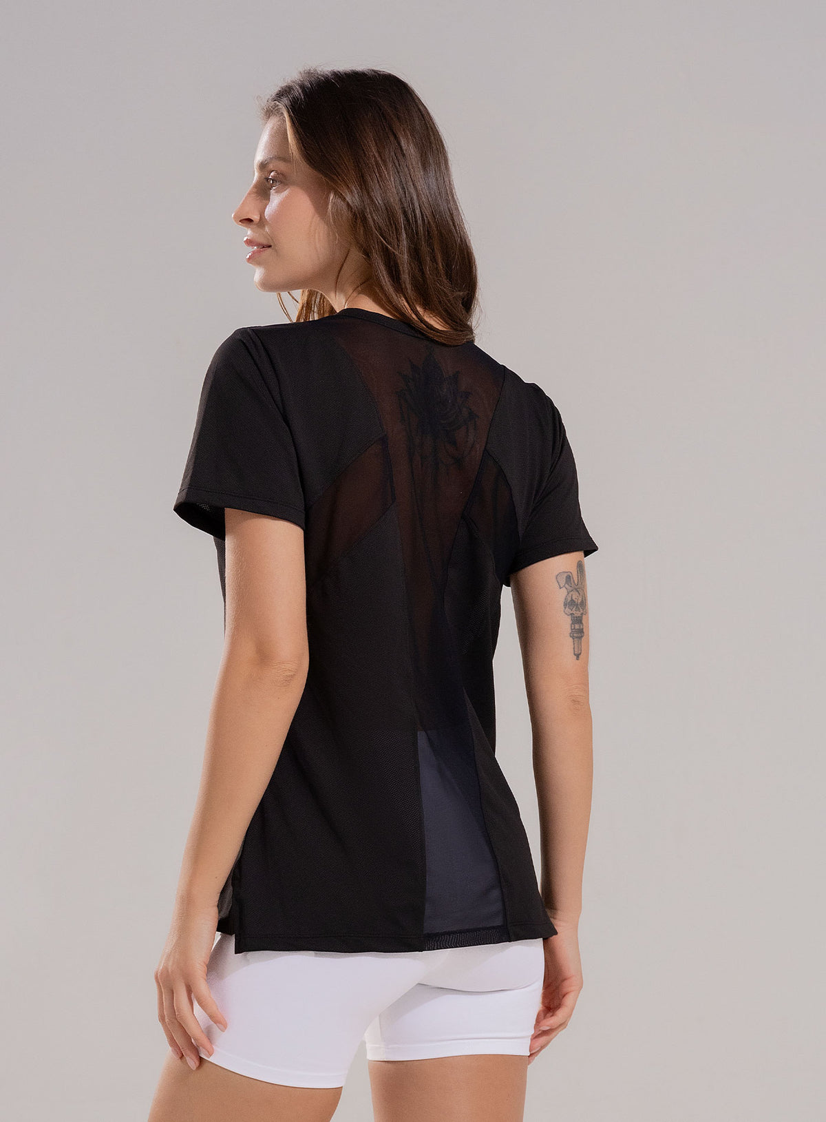 Camiseta deportiva color negro para mujer, marca BABALÚ, referencia 112543, vista trasera. Compra al por mayor en babalu.com.co en COP.