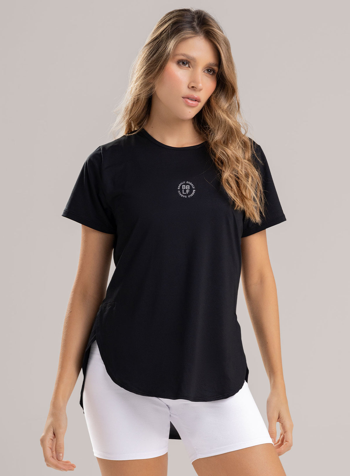 Camiseta deportiva color negro para mujer, marca BABALÚ, referencia 113893, vista frontal. Compra al por mayor en babalu.com.co en COP.