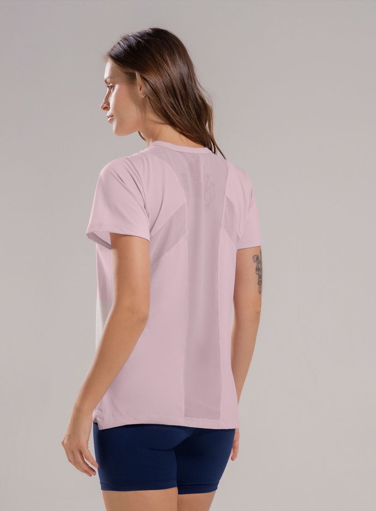 Camiseta deportiva color rosado para mujer, marca BABALÚ, referencia 112543, vista trasera. Compra al por mayor en babalu.com.co en COP.