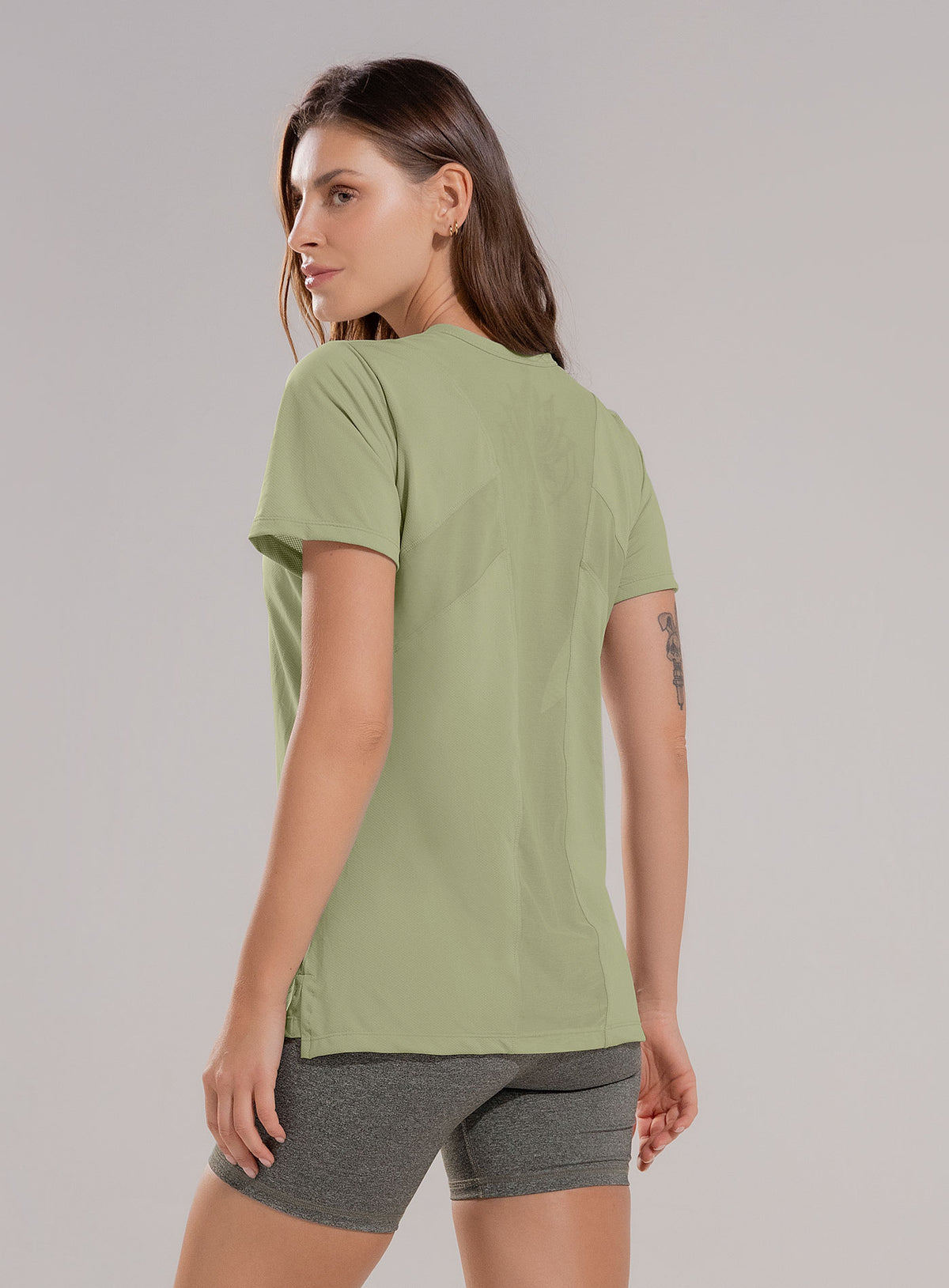 Camiseta deportiva color verde para mujer, marca BABALÚ, referencia 112543, vista trasera. Compra al por mayor en babalu.com.co en COP.