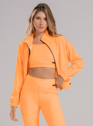 Chaqueta deportiva color coral para mujer, marca BABALÚ, referencia 112323, vista frontal. Compra al por mayor en babalu.com.co en COP.