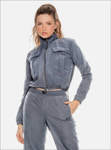 CHAQUETA DEPORTIVA SEMI IMPERMEABLE POLIÉSTER