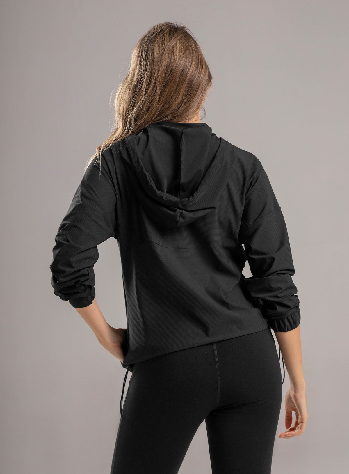 Chompa deportiva color negro para mujer, marca BABALÚ, referencia 113513, vista trasera. Compra al por mayor en babalu.com.co en COP.