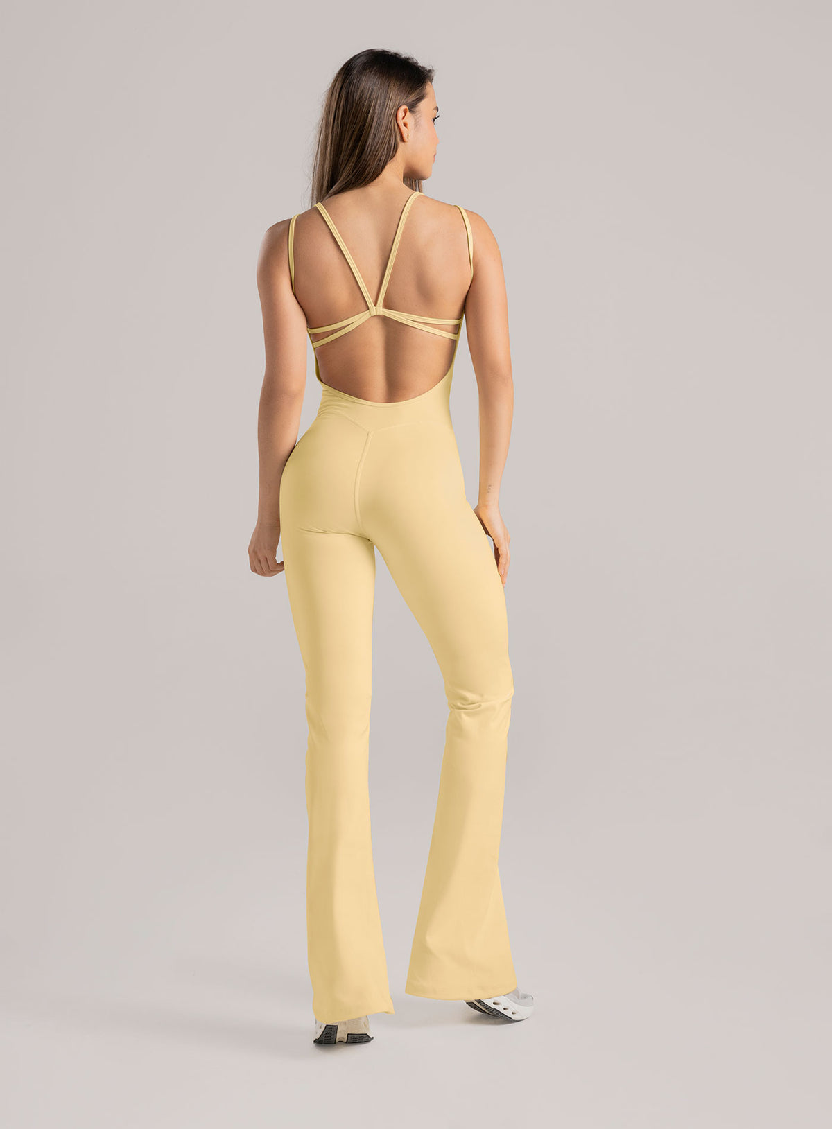 Enterizo deportivo color amarillo para mujer, marca BABALÚ, referencia 114833, vista trasera. Compra al por mayor en babalu.com.co en COP.