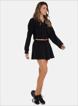 Falda deportiva con short interno tela semi impermeable