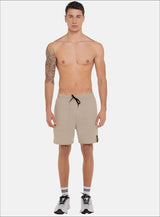 PANTALONETA EN TELA BURDA CON BOLSILLOS EN COSTADOS