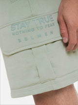 PANTALONETA EN TELA BURDA CON BOLSILLO SOBREPUESTO