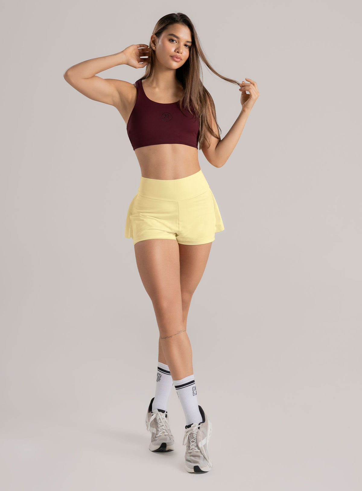 Short deportivo color amarillo para mujer, marca BABALÚ, referencia 114233, vista frontal. Compra al por mayor en babalu.com.co en COP.