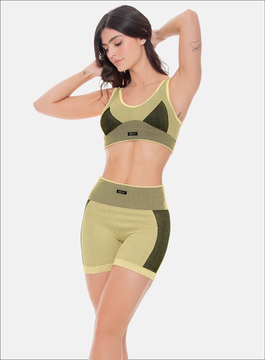 Top deportivo color amarillo para mujer, marca BABALÚ, referencia 108873, vista frontal. Compra al por mayor en babalu.com.co en COP.
