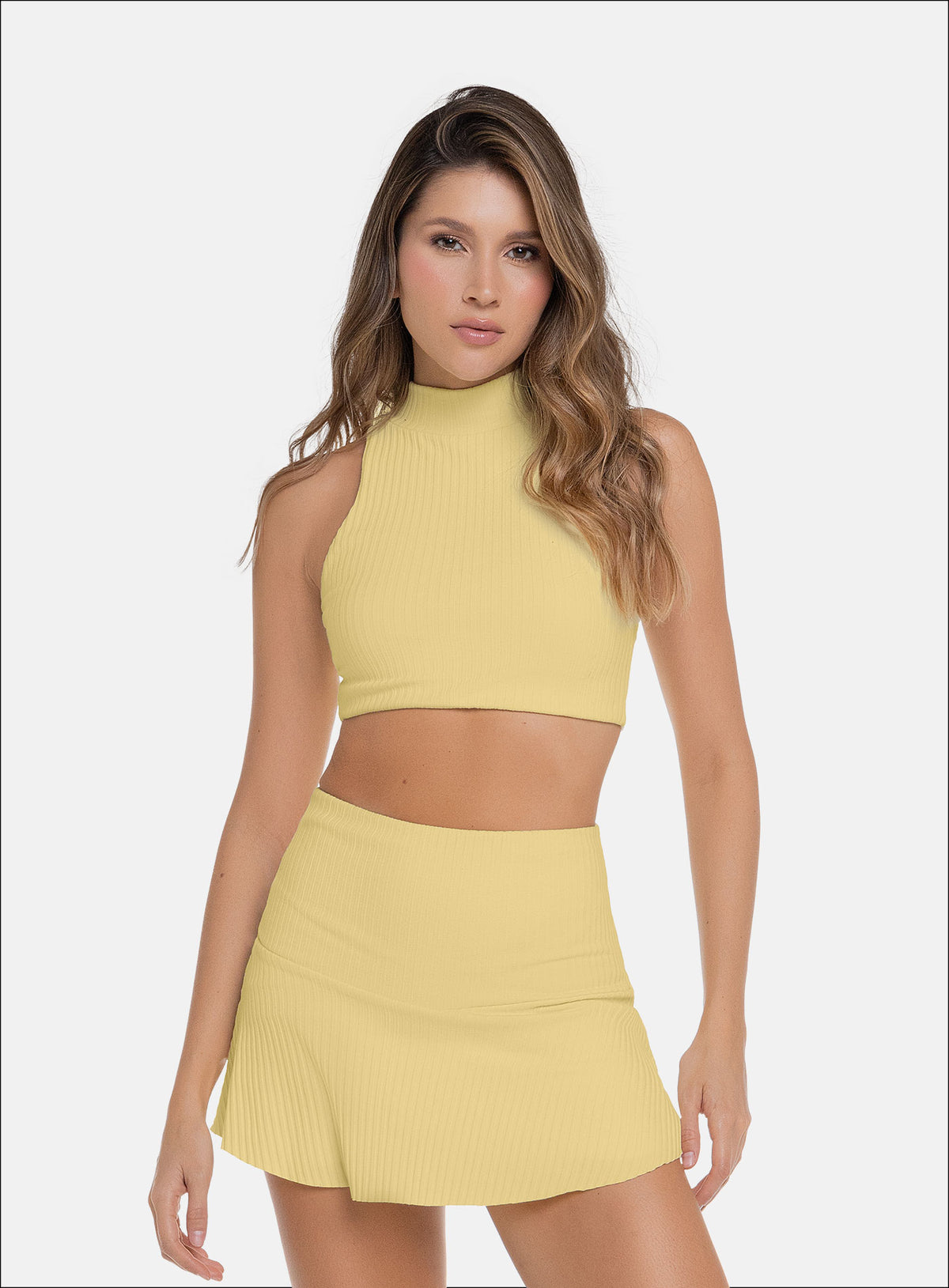 Top deportivo color amarillo para mujer, marca BABALÚ, referencia 111673, vista frontal. Compra al por mayor en babalu.com.co en COP.
