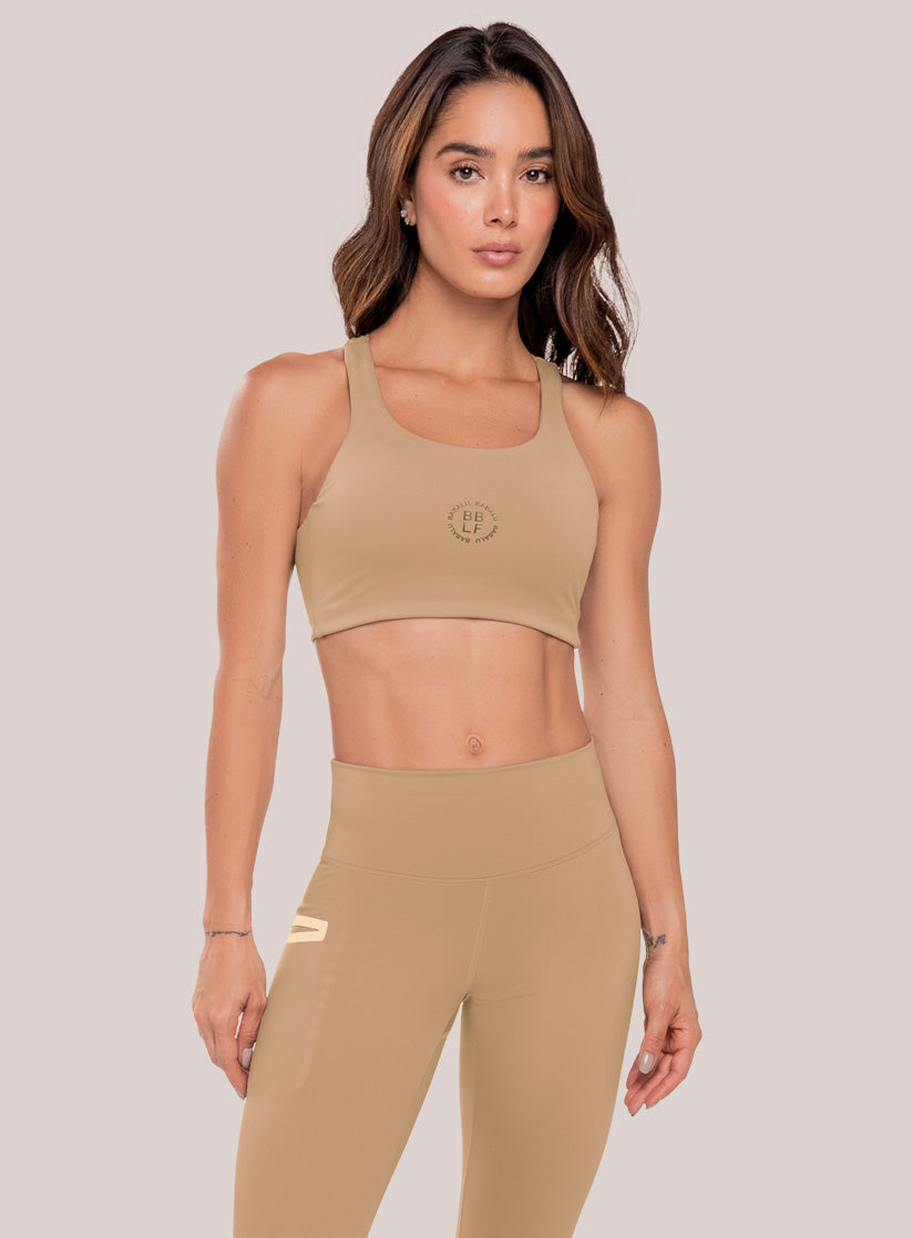 Top deportivo color beige para mujer, marca BABALÚ, referencia 111073, vista frontal. Compra al por mayor en babalu.com.co en COP.