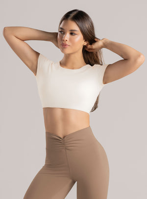 Top deportivo color marfil para mujer, marca BABALÚ, referencia 113673, vista frontal. Compra al por mayor en babalu.com.co en COP.