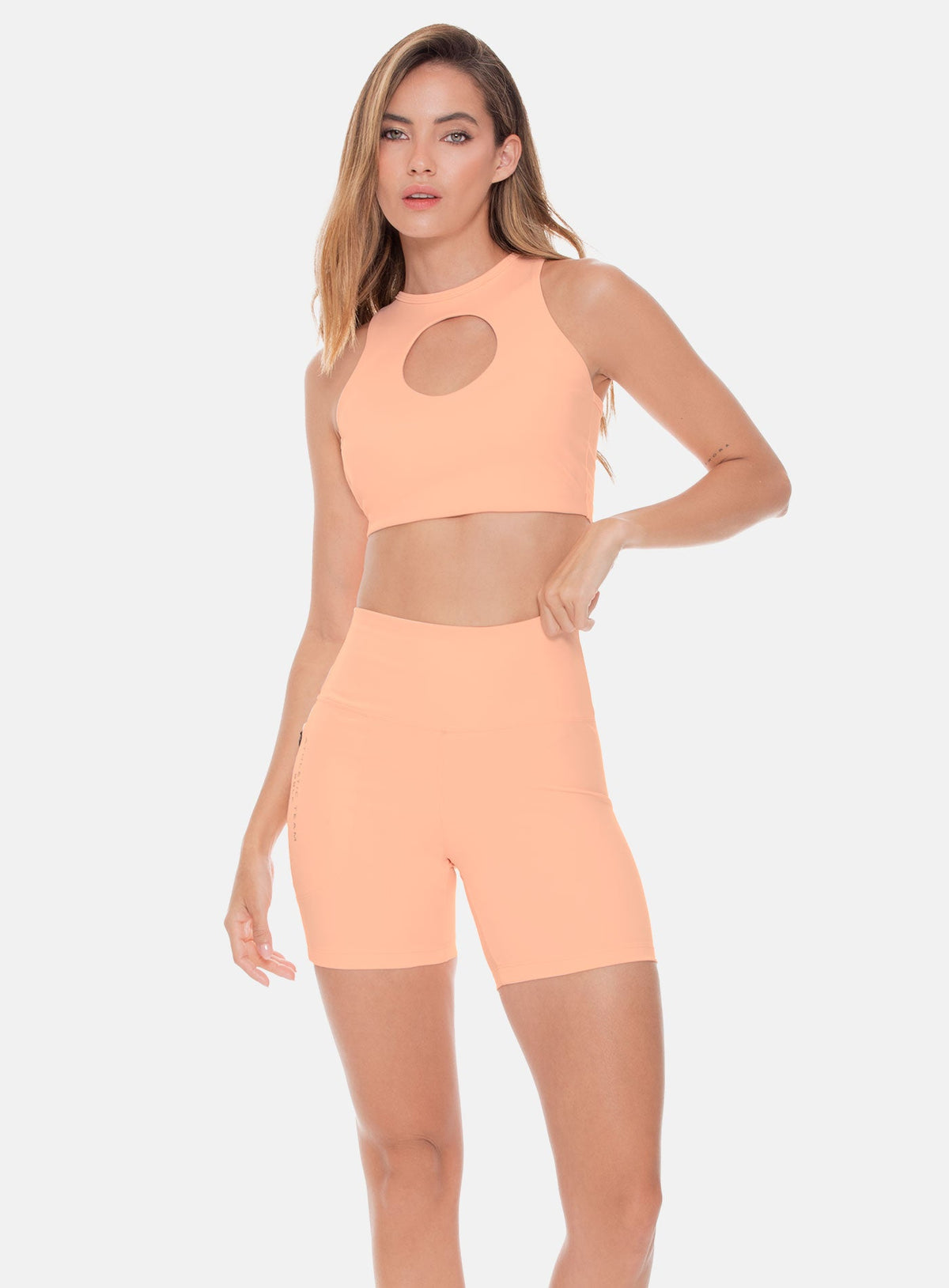 Top deportivo color melon para mujer, marca BABALÚ, referencia 108813, vista frontal. Compra al por mayor en babalu.com.co en COP.