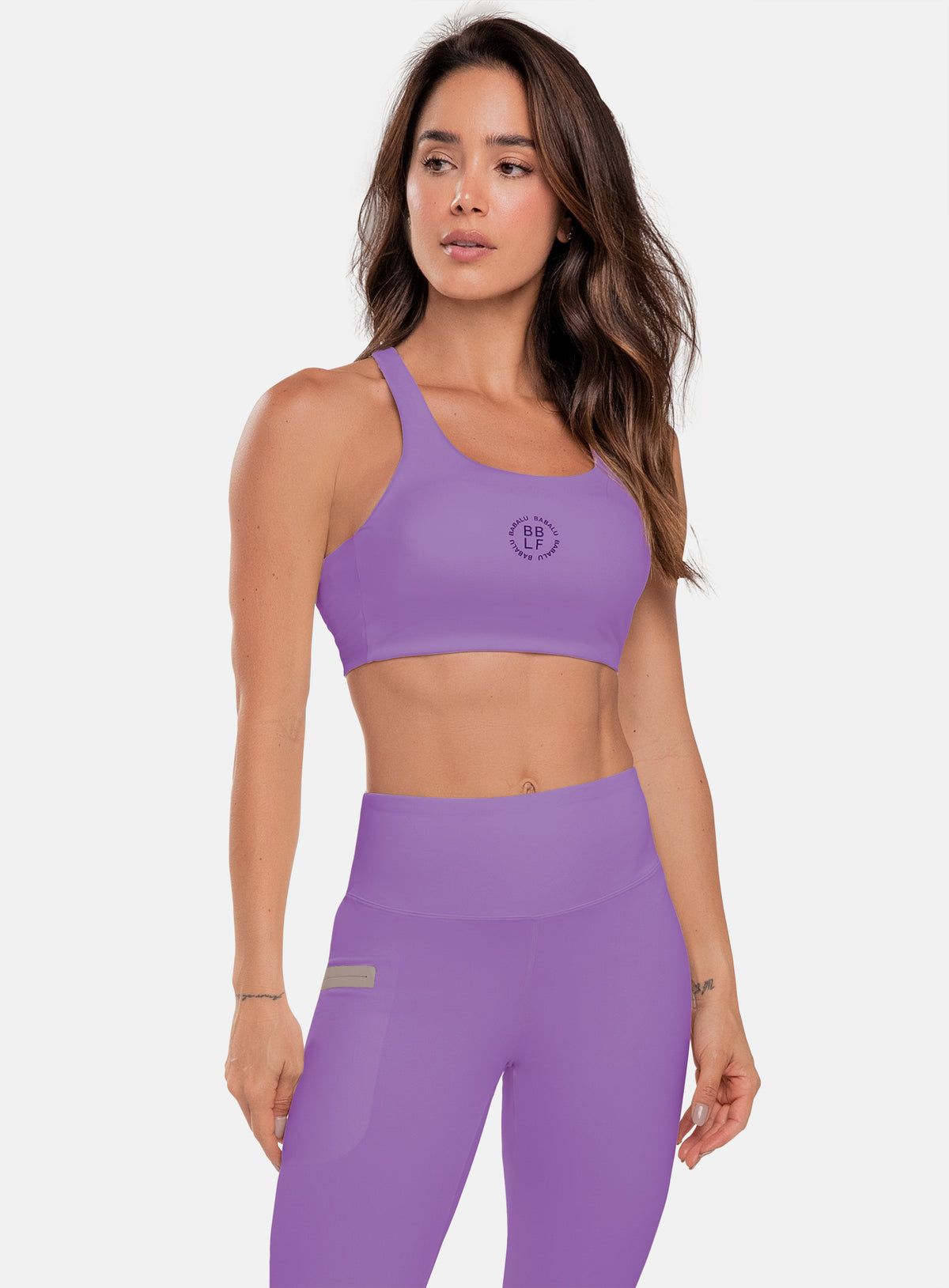 Top deportivo color morado para mujer, marca BABALÚ, referencia 111073, vista frontal. Compra al por mayor en babalu.com.co en COP.