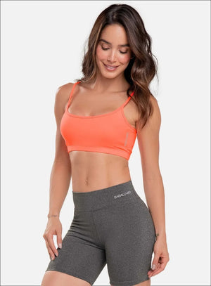 Top deportivo color naranja para mujer, marca BABALÚ, referencia 15943, vista frontal. Compra al por mayor en babalu.com.co en COP.