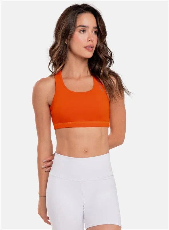 Top deportivo color naranja para mujer, marca BABALÚ, referencia 30053, vista frontal. Compra al por mayor en babalu.com.co en COP.