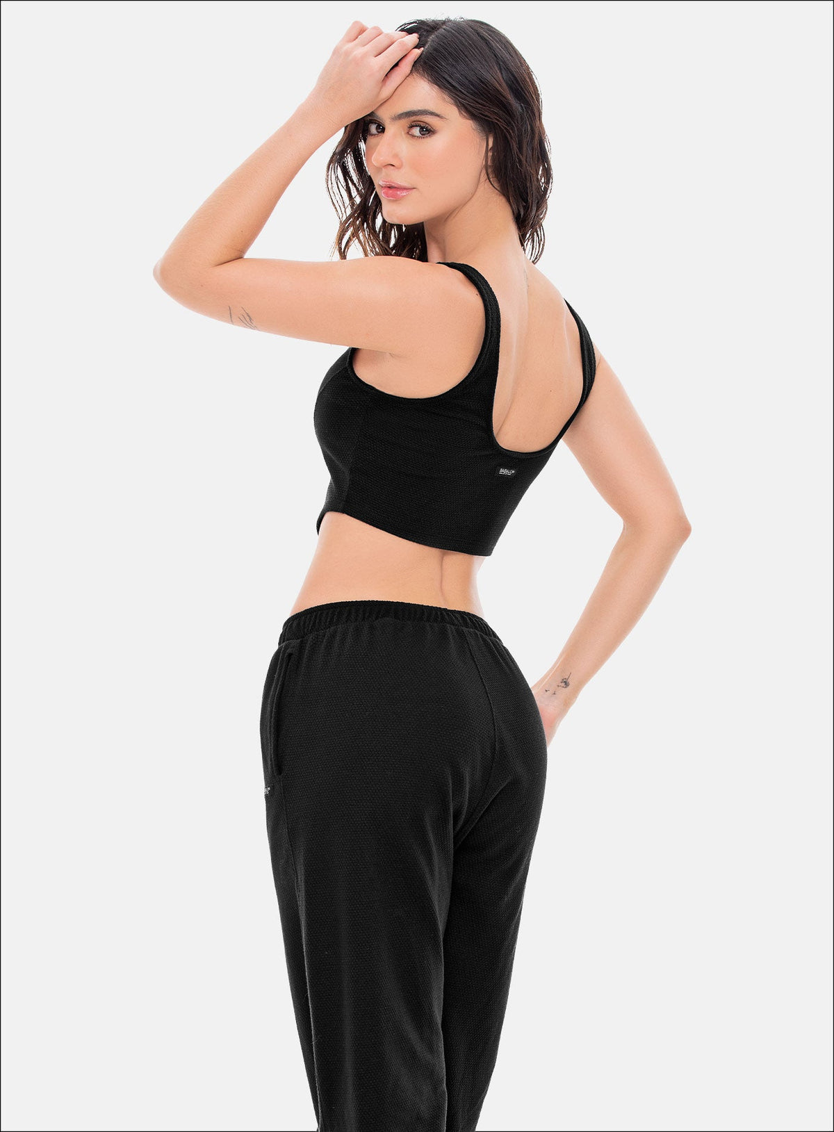 Top deportivo color negro para mujer, marca BABALÚ, referencia 107983, vista trasera. Compra al por mayor en babalu.com.co en COP.