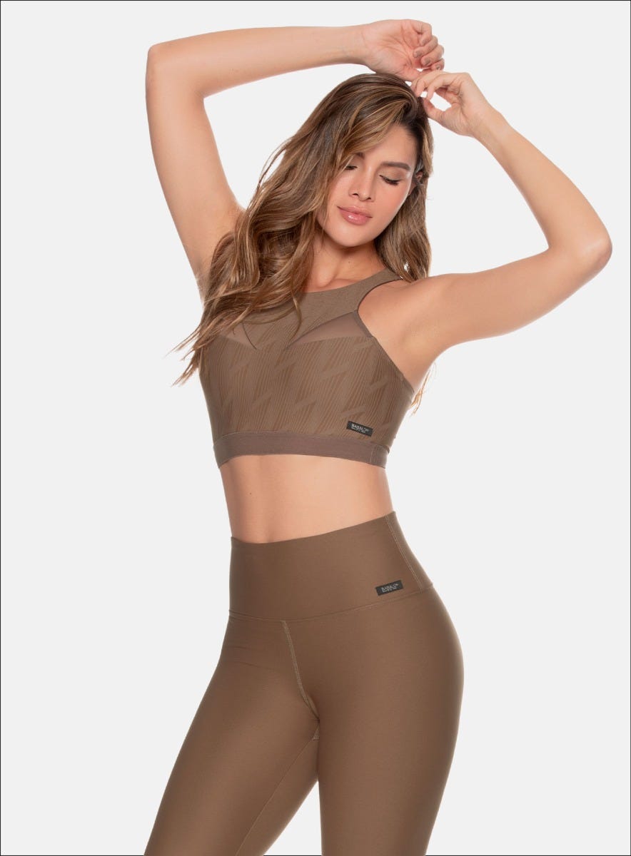 TOP DEPORTIVO EN TELA JACQUARD CON SULIMADO EN FIGURA GEOMETRICA