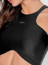 TOP CON ELASTICO ENCARTERADOS DISEÑO EN FRENTE CON CURVA EN CINTURA TELA EFECTO BRILLANTE TACTO SUAVE